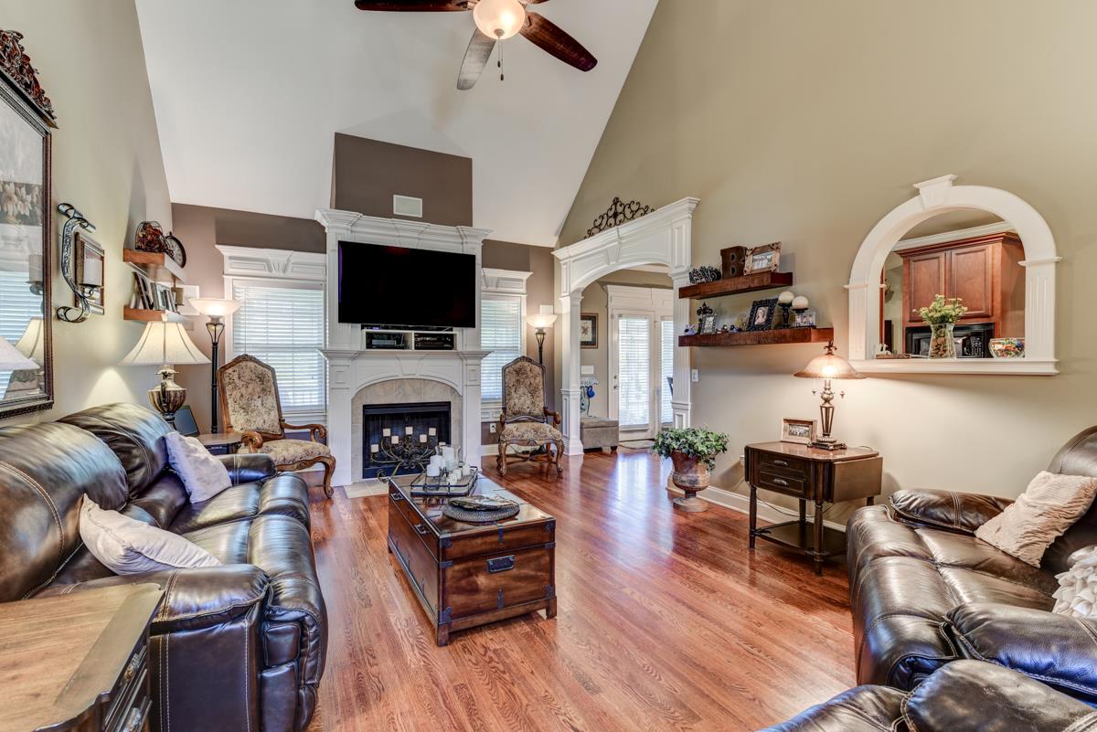 3338 Allen Barrett Road Murfreesboro, TN 37129 - Photo 4 of 27 a living room with furniture fireplace and flat screen tv