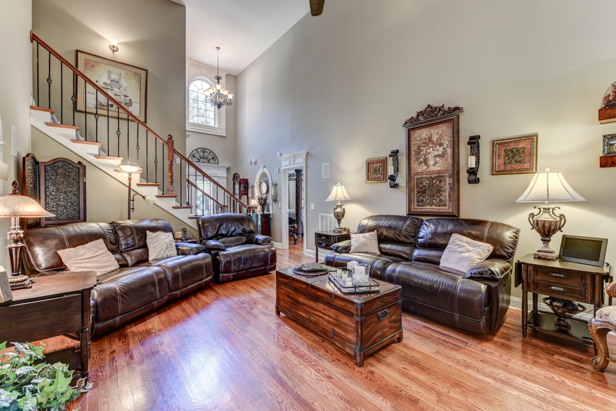 3338 Allen Barrett Road Murfreesboro, TN 37129 - Photo 5 of 27 a living room with fireplace furniture and a wooden floor