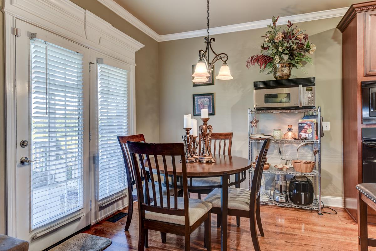 3338 Allen Barrett Road Murfreesboro, TN 37129 - Photo 8 of 27 a view of a dining room with furniture wooden floor and chandelier