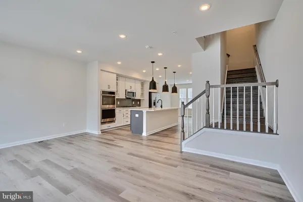 a view of kitchen with wooden floor