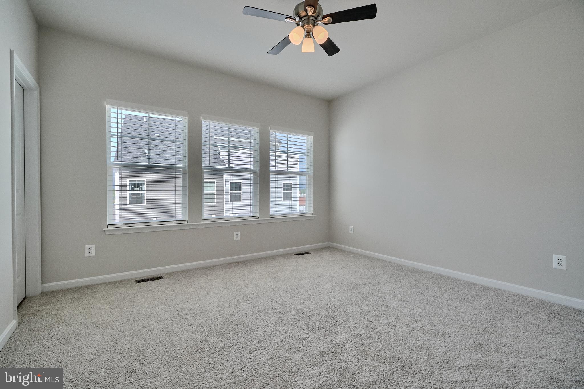 2509 Gatwick Lane, Unit 60 Frederick, MD 21701 - Photo 22 of 30 a view of an empty room with a window