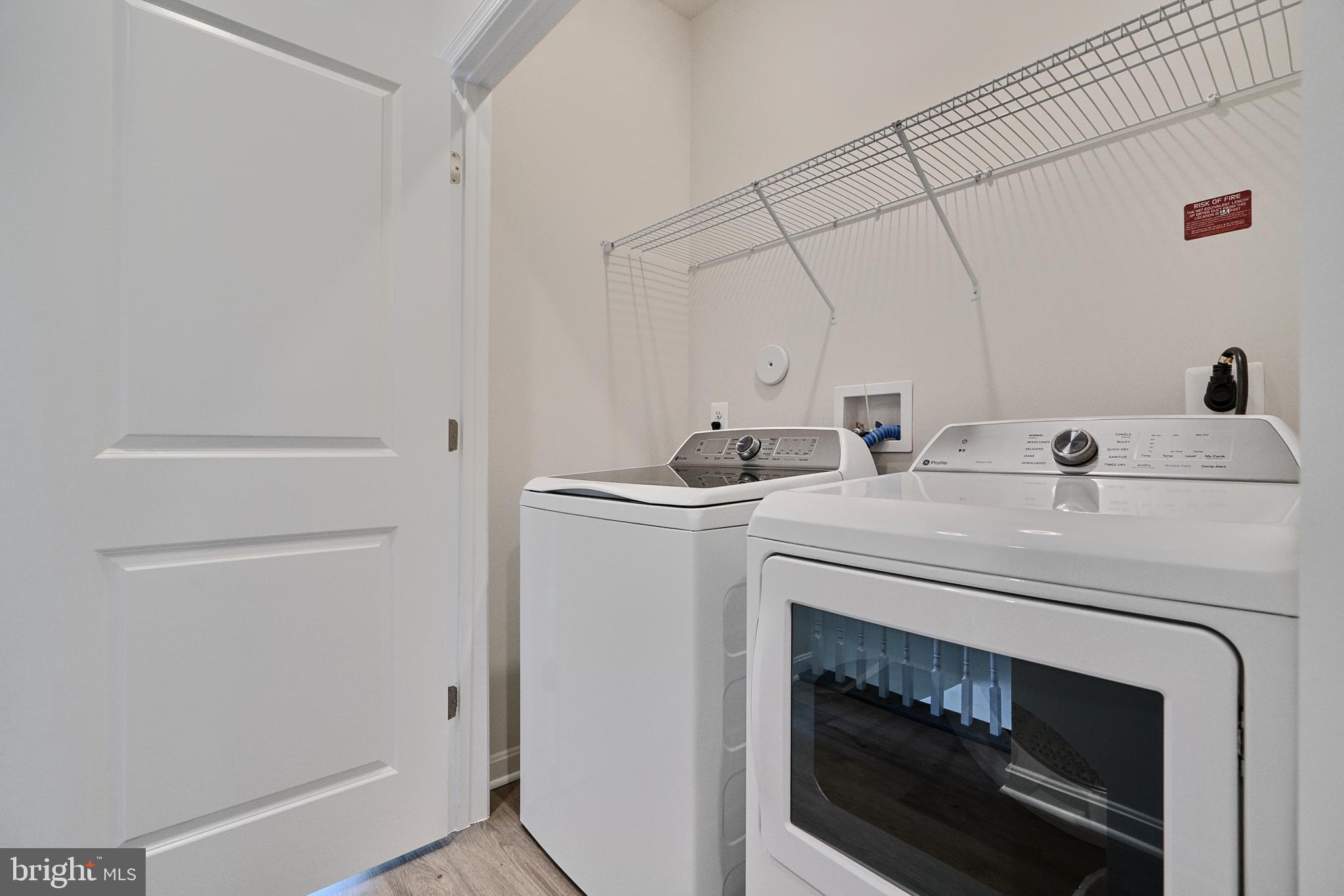 2509 Gatwick Lane, Unit 60 Frederick, MD 21701 - Photo 28 of 30 a utility room with dryer and washer