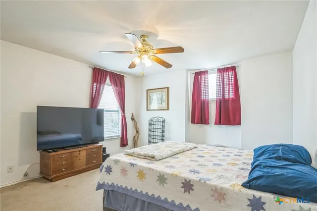 a view of a backyard with a patio