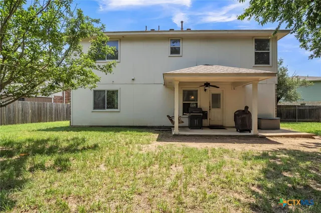 a view of a field with grass
