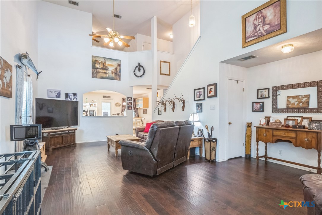 101 Cannery Cove Leander, TX 78641 - Photo 4 of 40 a living room with furniture and a flat screen tv