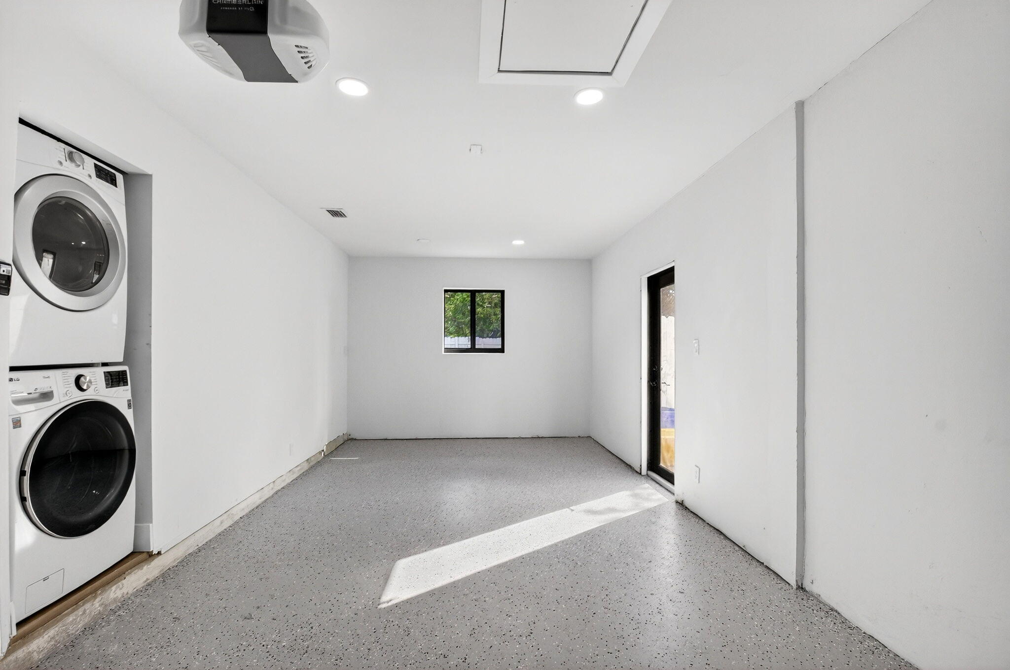 10151 Windtree Lane Boca Raton, FL 33428 - Photo 28 of 39 a view of a hallway with washer and dryer