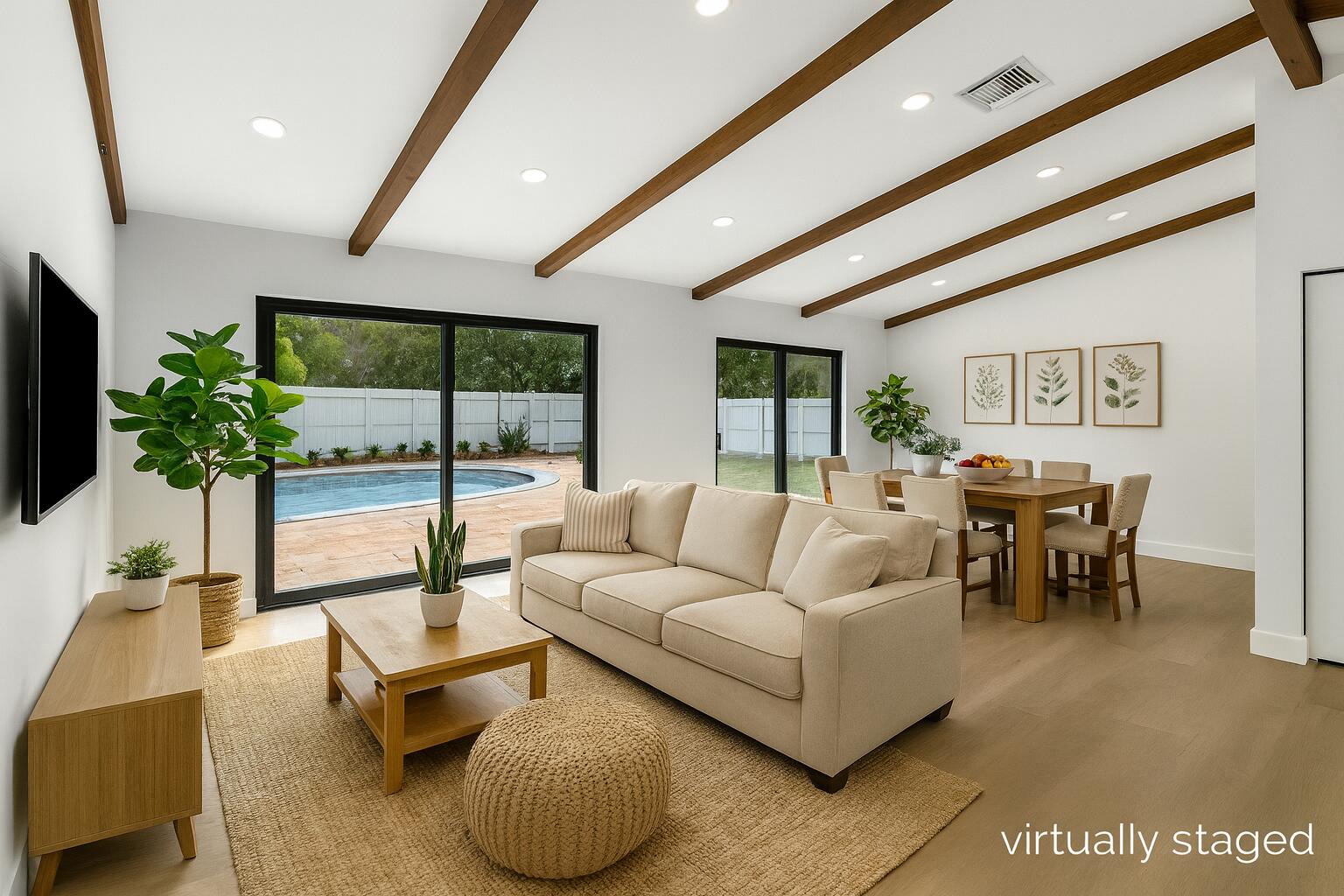 10151 Windtree Lane Boca Raton, FL 33428 - Photo 9 of 39 a living room with furniture and a flat screen tv