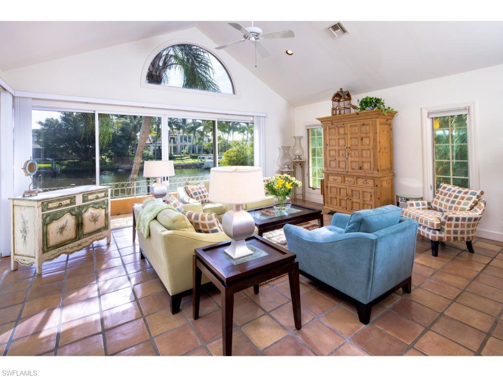 3275 Gin Lane Naples, FL 34102 - Photo 4 of 13 a living room with furniture and a large window