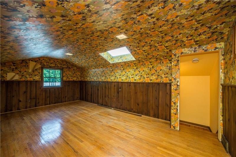 359 Beadling Road Pittsburgh, PA 15228 - Photo 15 of 25 The upper level bedroom is large, at 20ft x 14ft, the opportunities for this space are endless. The room is enhanced by a skylight and hardwood floors.
