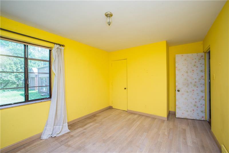 359 Beadling Road Pittsburgh, PA 15228 - Photo 10 of 25 The smallest of the bedrooms (still nicely sized) is equipped with a roomy closet, overhead lighting, and two windows allowing in tons of natural light. The view through the window seen here is to the front of the property.