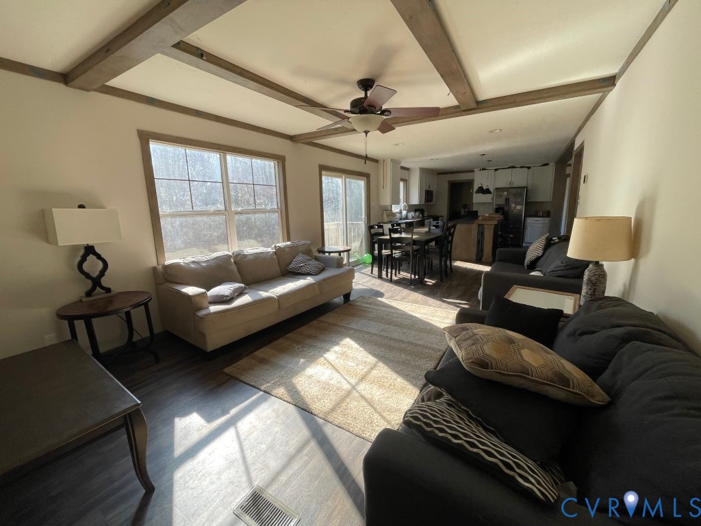 97 Buster Lane West Point, VA 23181 - Photo 14 of 32 a living room with furniture and a window