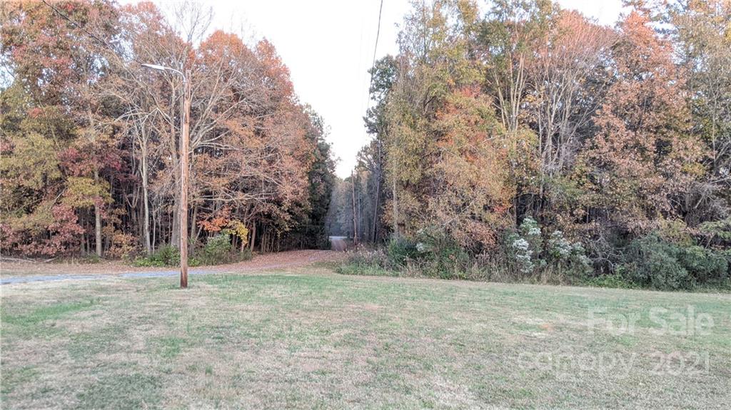 4020 Richardson Road Monroe, NC 28112 - Photo 18 of 18 a view of a field with trees in the background