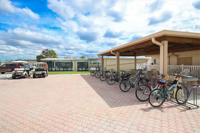 a view of a bike storage and utility room