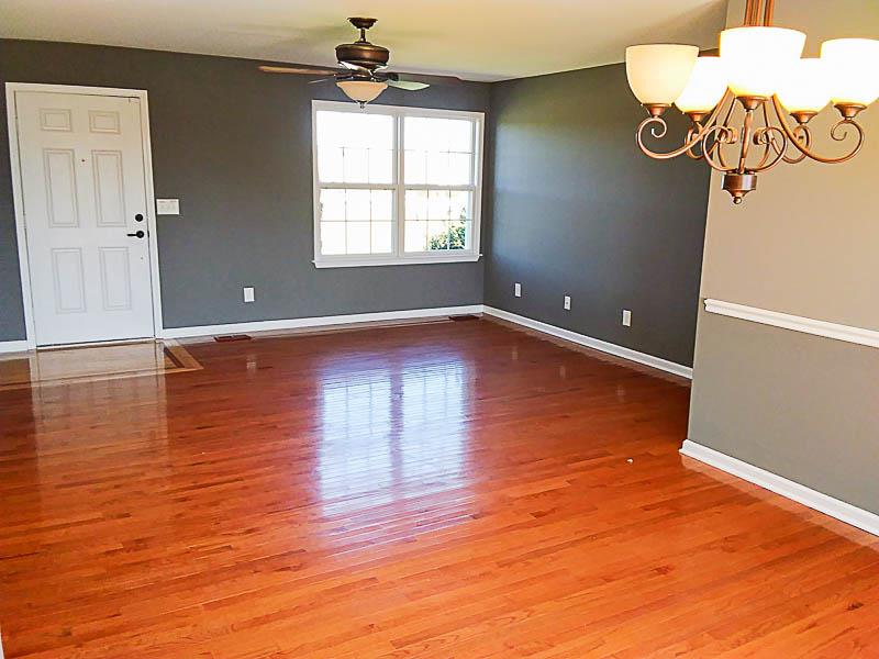 1535 Heller Ridge Spring Hill, TN 37174 - Photo 3 of 23 a view of an empty room with wooden floor and a window