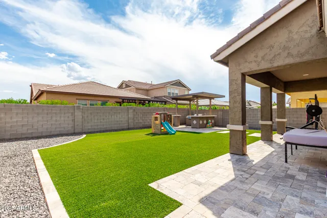 a view of a garden with a slide