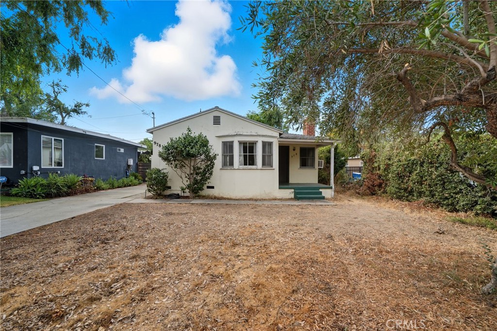 978 West Lehigh Street Altadena, CA 91001 - Photo 13 of 49 front view of a house with a plants and trees