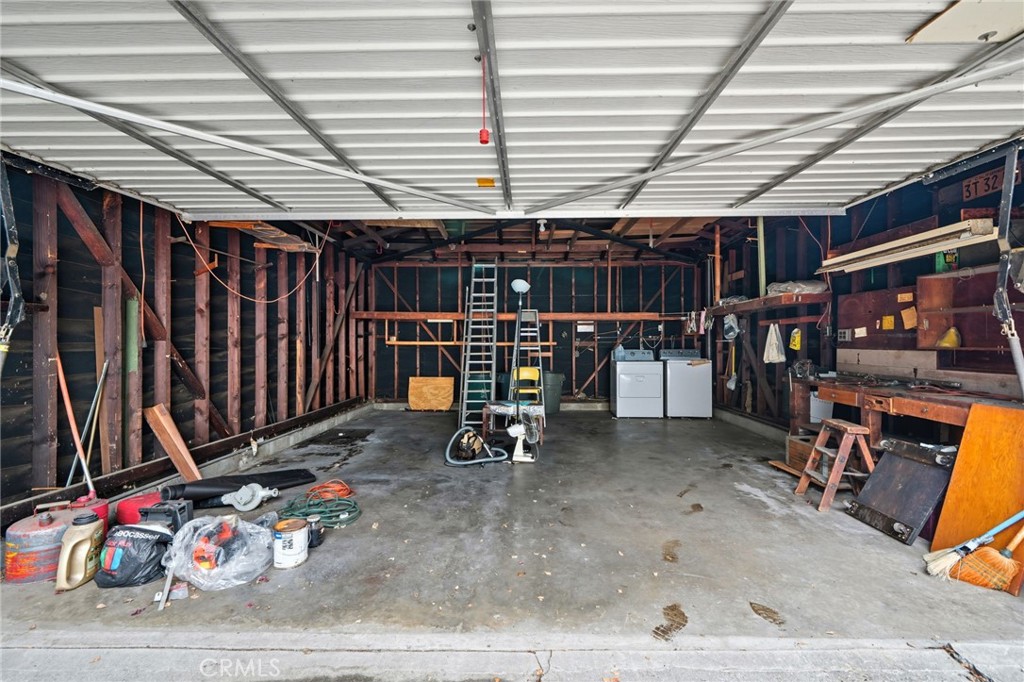 978 West Lehigh Street Altadena, CA 91001 - Photo 20 of 49 an empty room with wooden floor and gym equipment