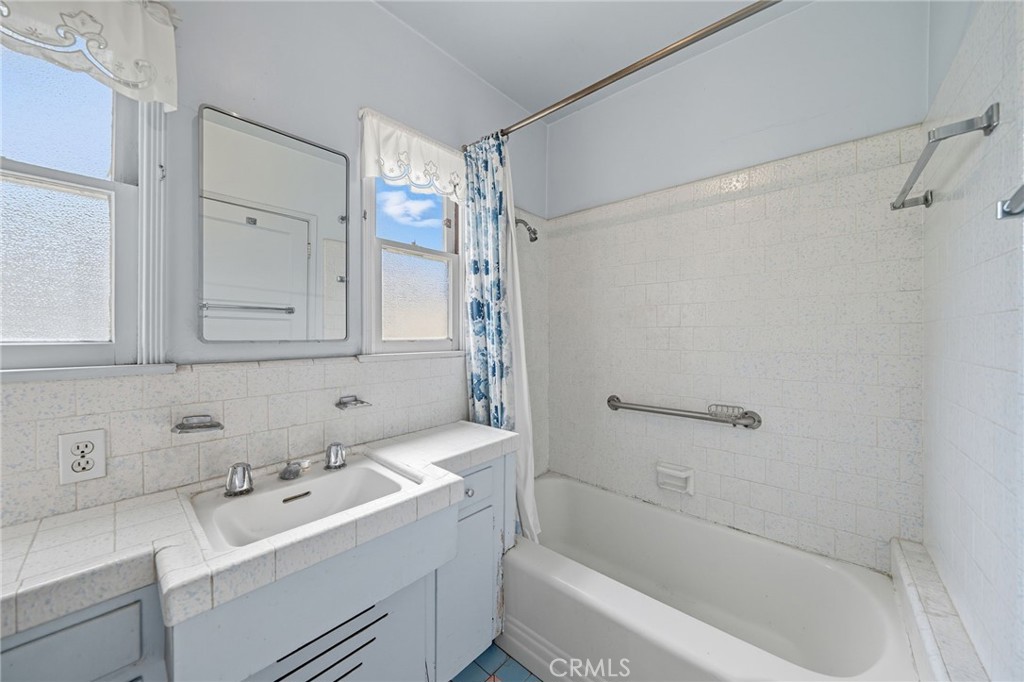 978 West Lehigh Street Altadena, CA 91001 - Photo 43 of 49 a bathroom with a sink a toilet and shower