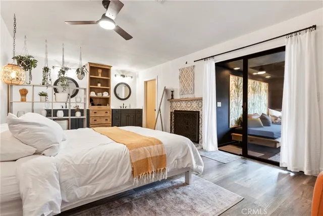 a bedroom with a bed and a mirror