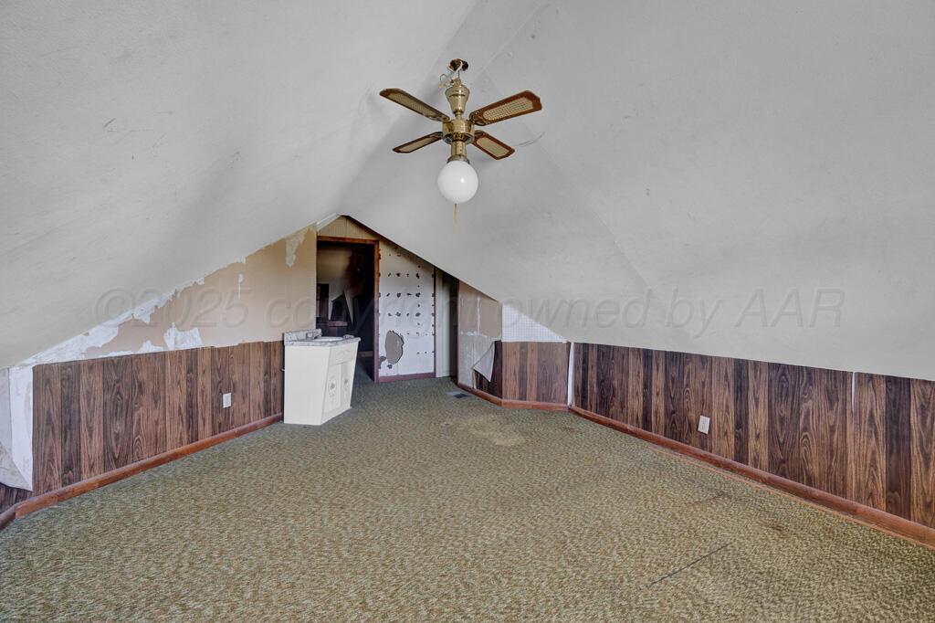 404 Chester Avenue Panhandle, TX 79068 - Photo 20 of 33 a view of a livingroom with a ceiling fan and window