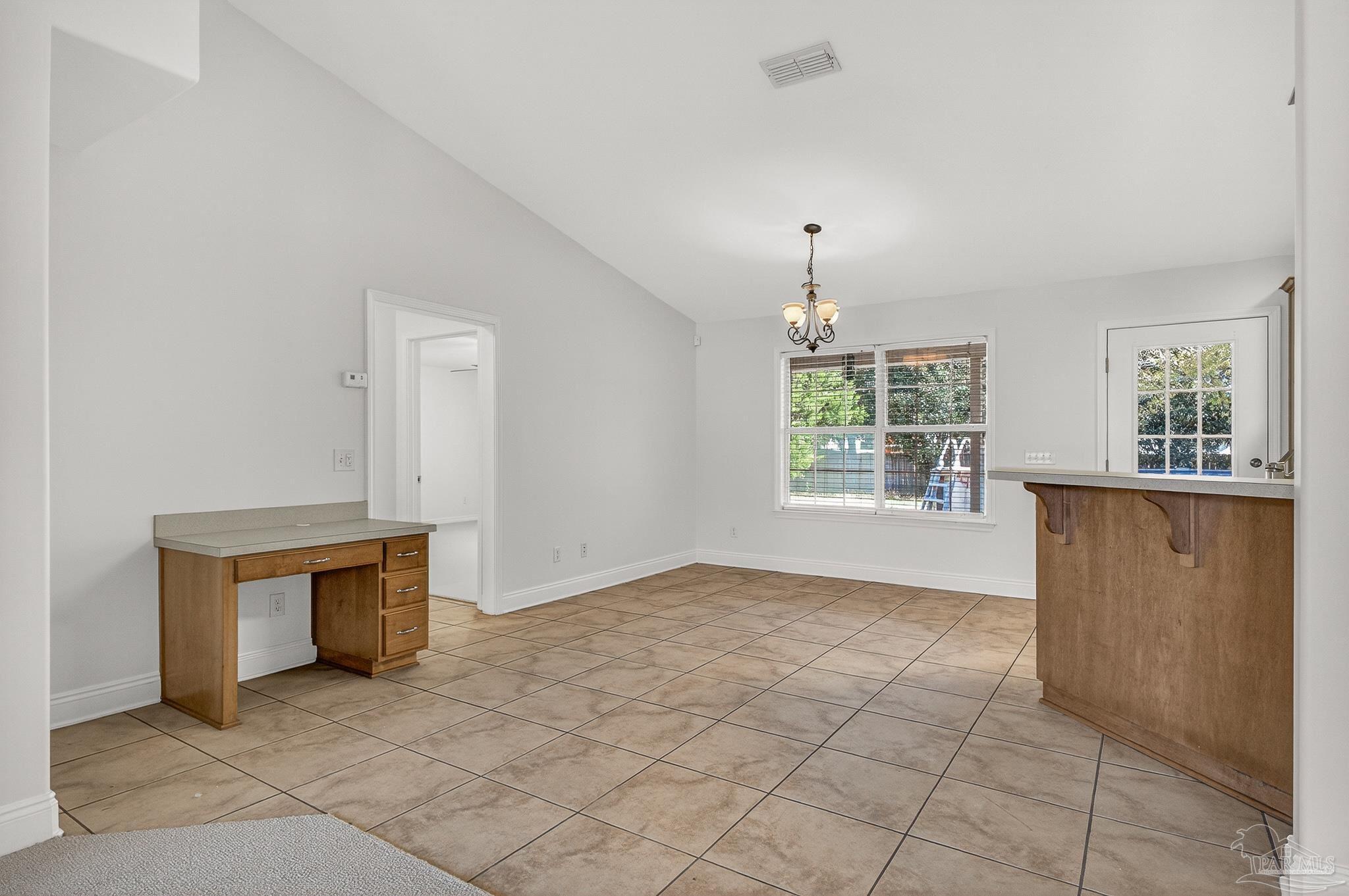 6050 Antelope Street Milton, FL 32570 - Photo 11 of 58 a view of an empty room with a window