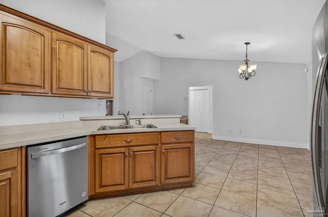 a view of a hallway with a bathroom and a sink