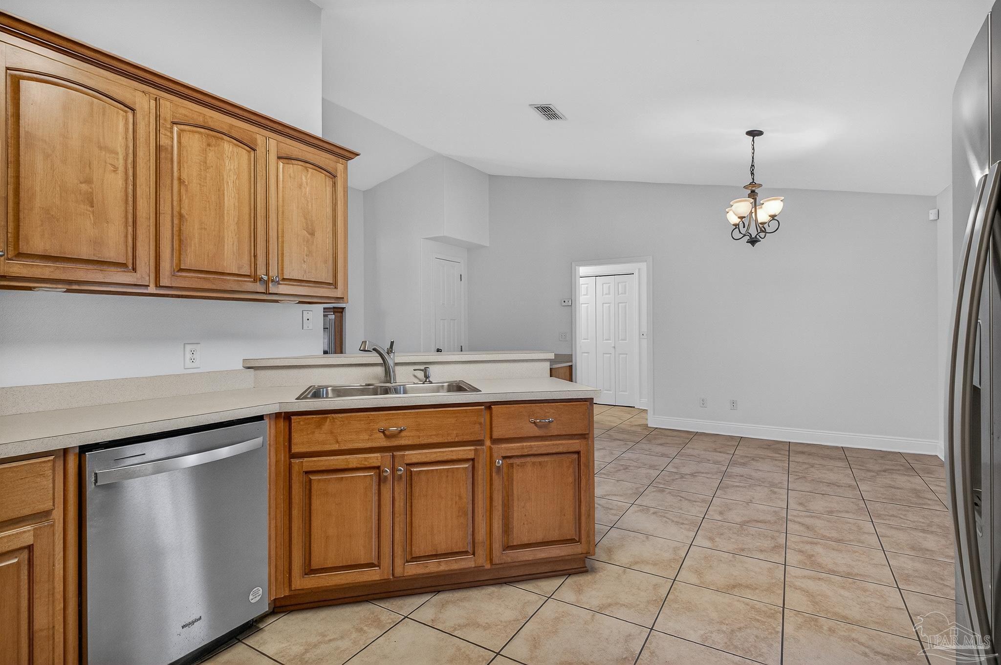 6050 Antelope Street Milton, FL 32570 - Photo 20 of 58 a kitchen with a sink and cabinets