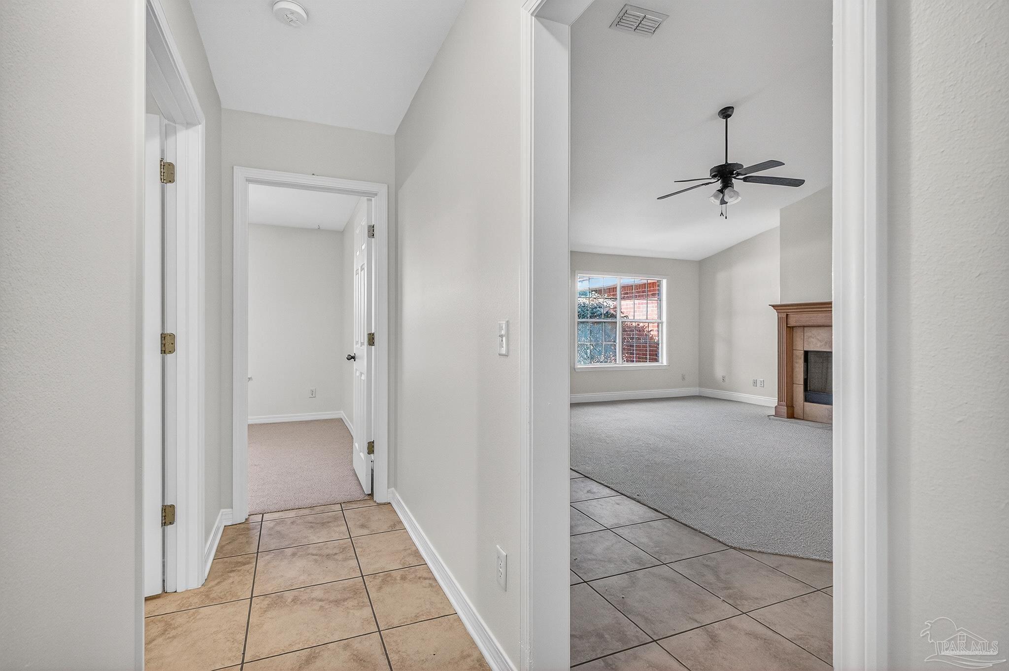 6050 Antelope Street Milton, FL 32570 - Photo 21 of 58 a view of a hallway with a bathroom and a sink