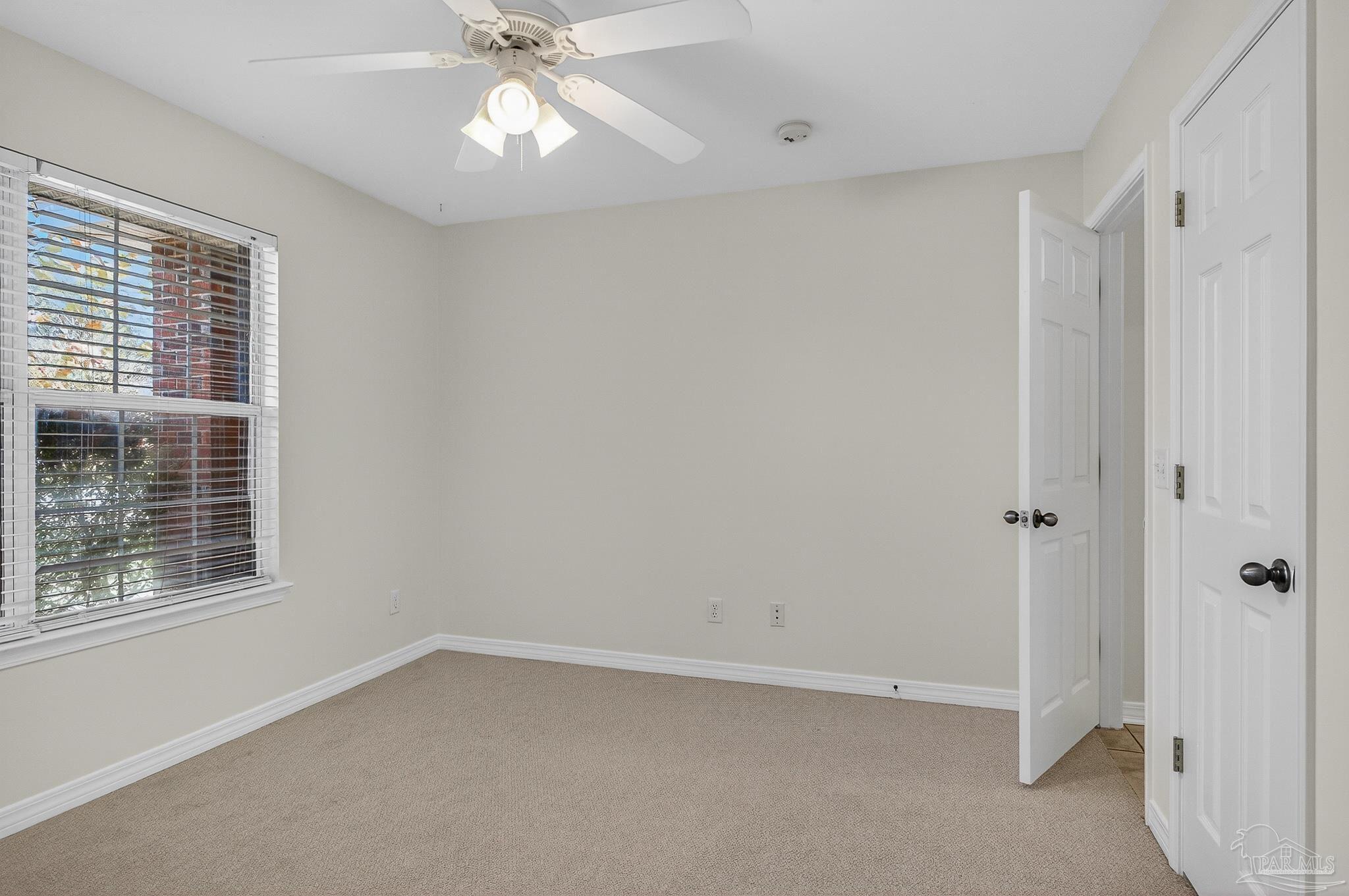 6050 Antelope Street Milton, FL 32570 - Photo 25 of 58 a view of an empty room with a window