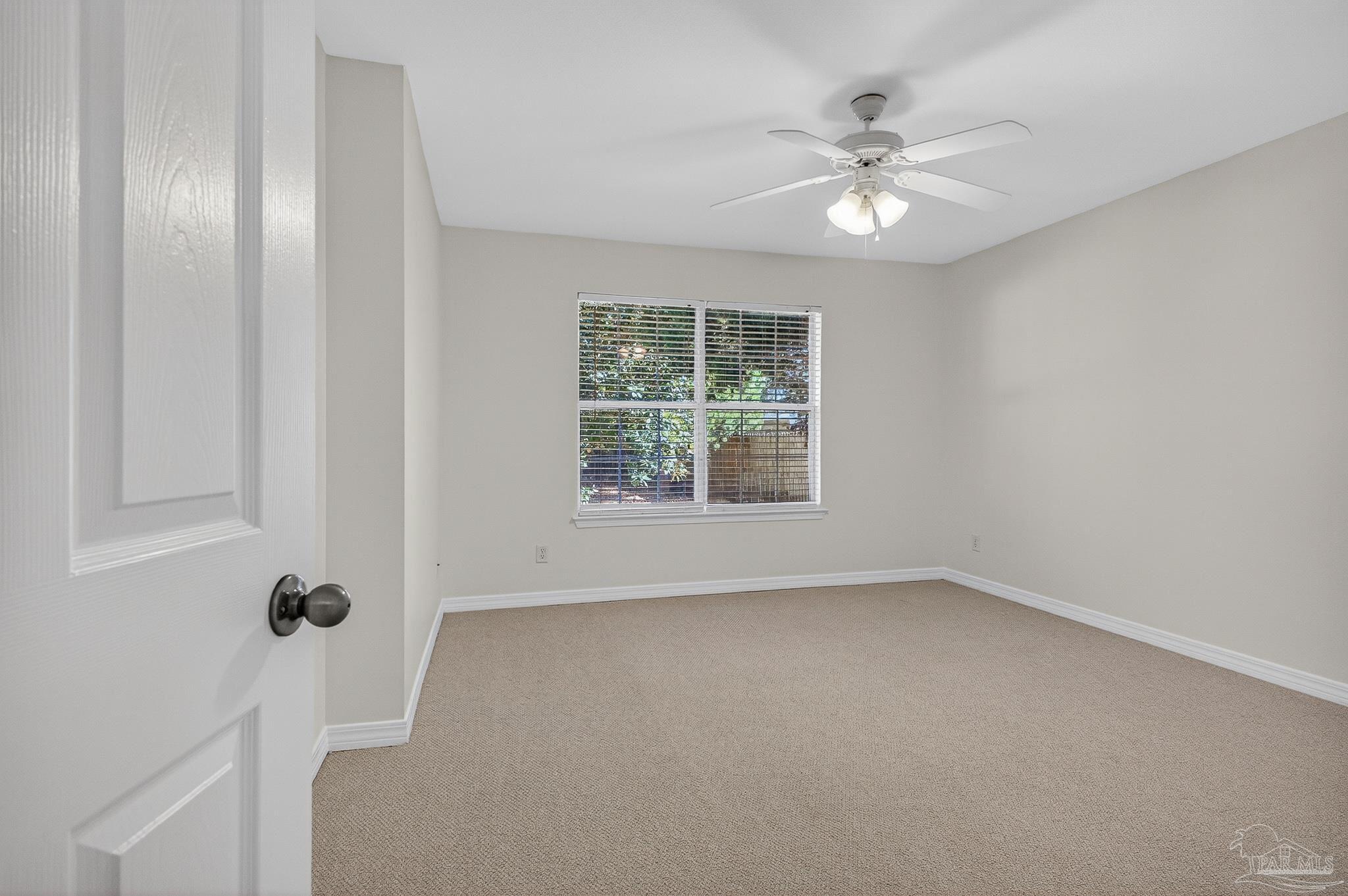 6050 Antelope Street Milton, FL 32570 - Photo 33 of 58 a view of an empty room with a window