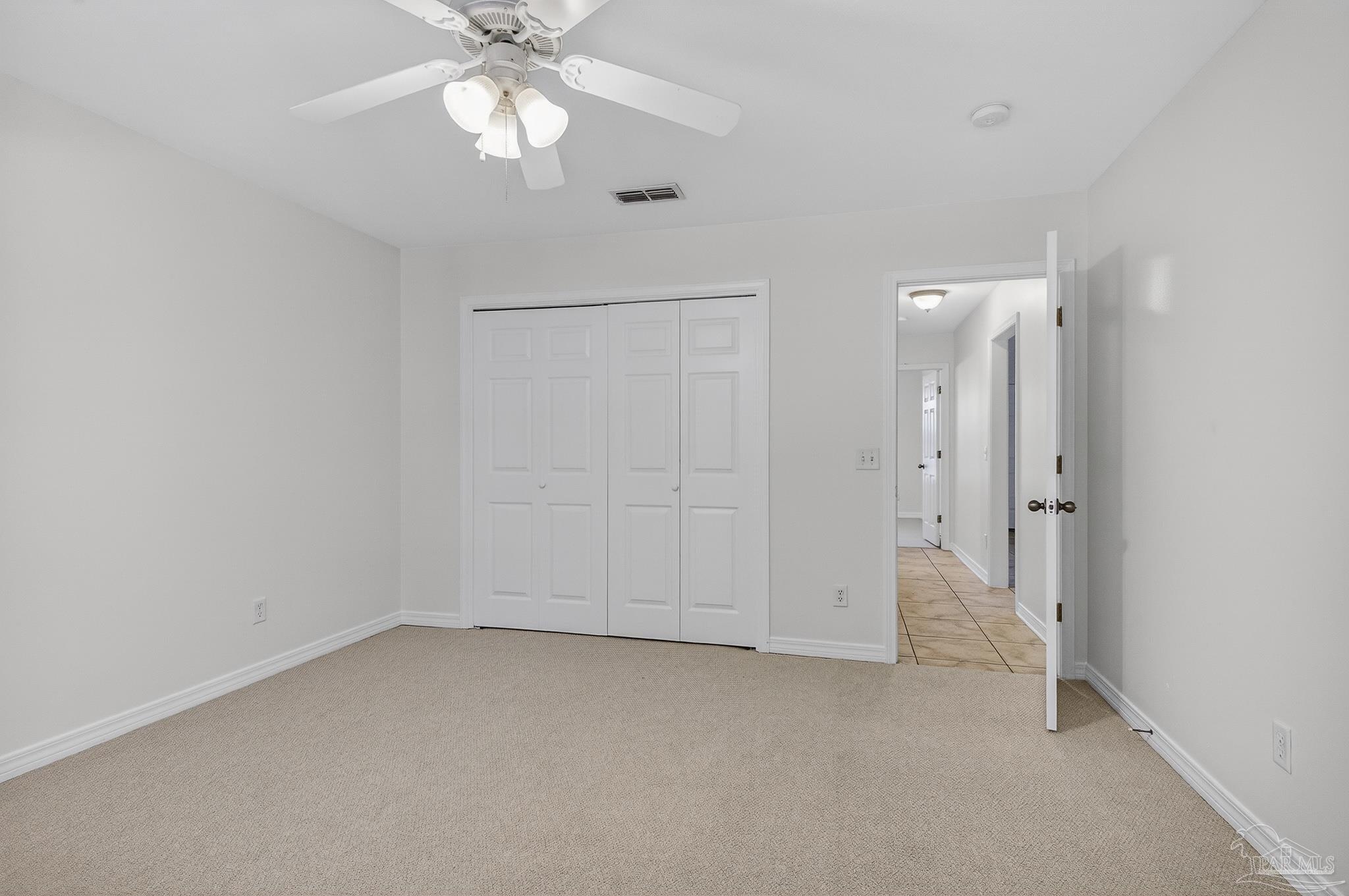 6050 Antelope Street Milton, FL 32570 - Photo 36 of 58 wooden floor in an empty room