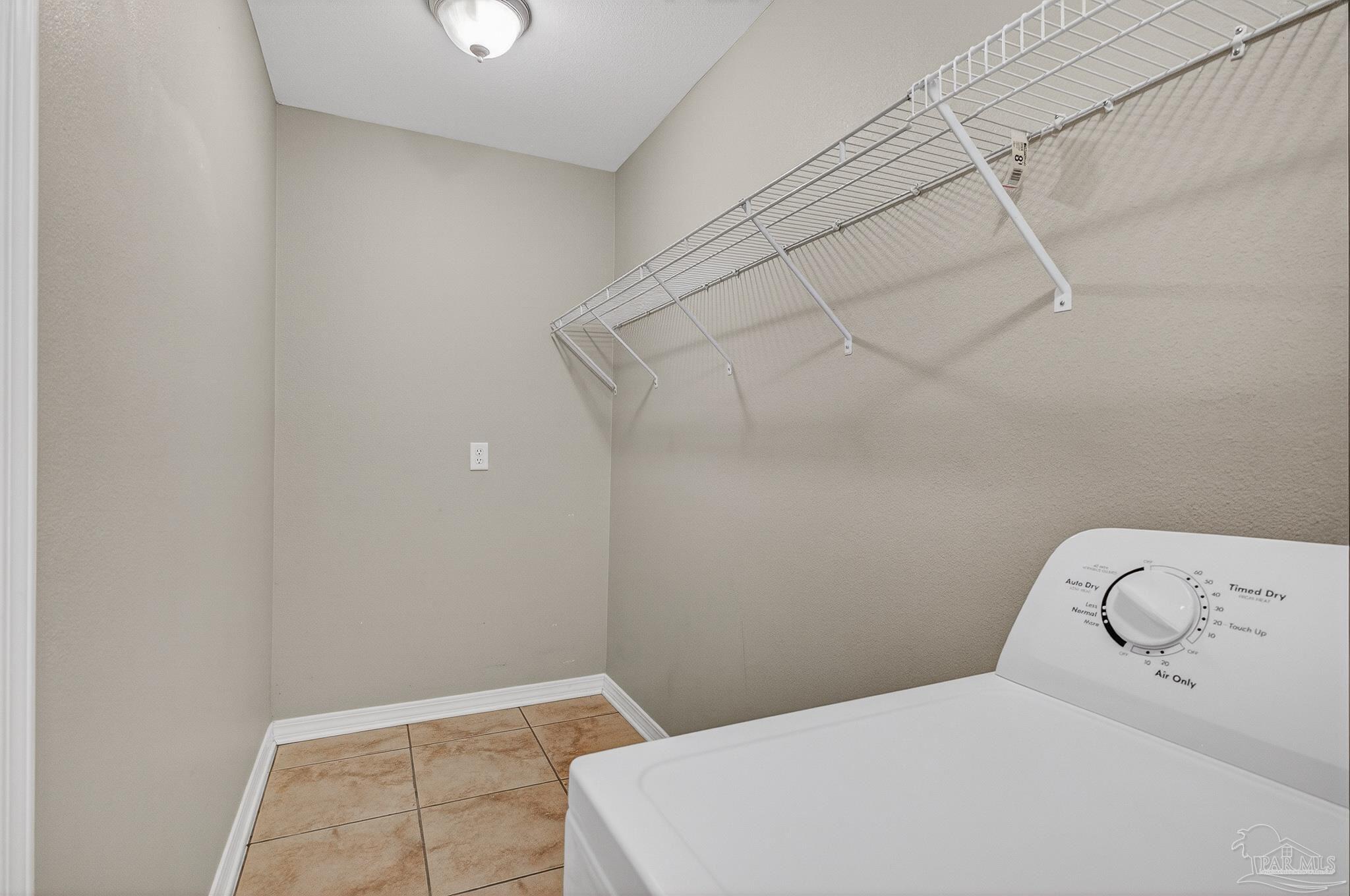 6050 Antelope Street Milton, FL 32570 - Photo 40 of 58 a bedroom with a bed and a window