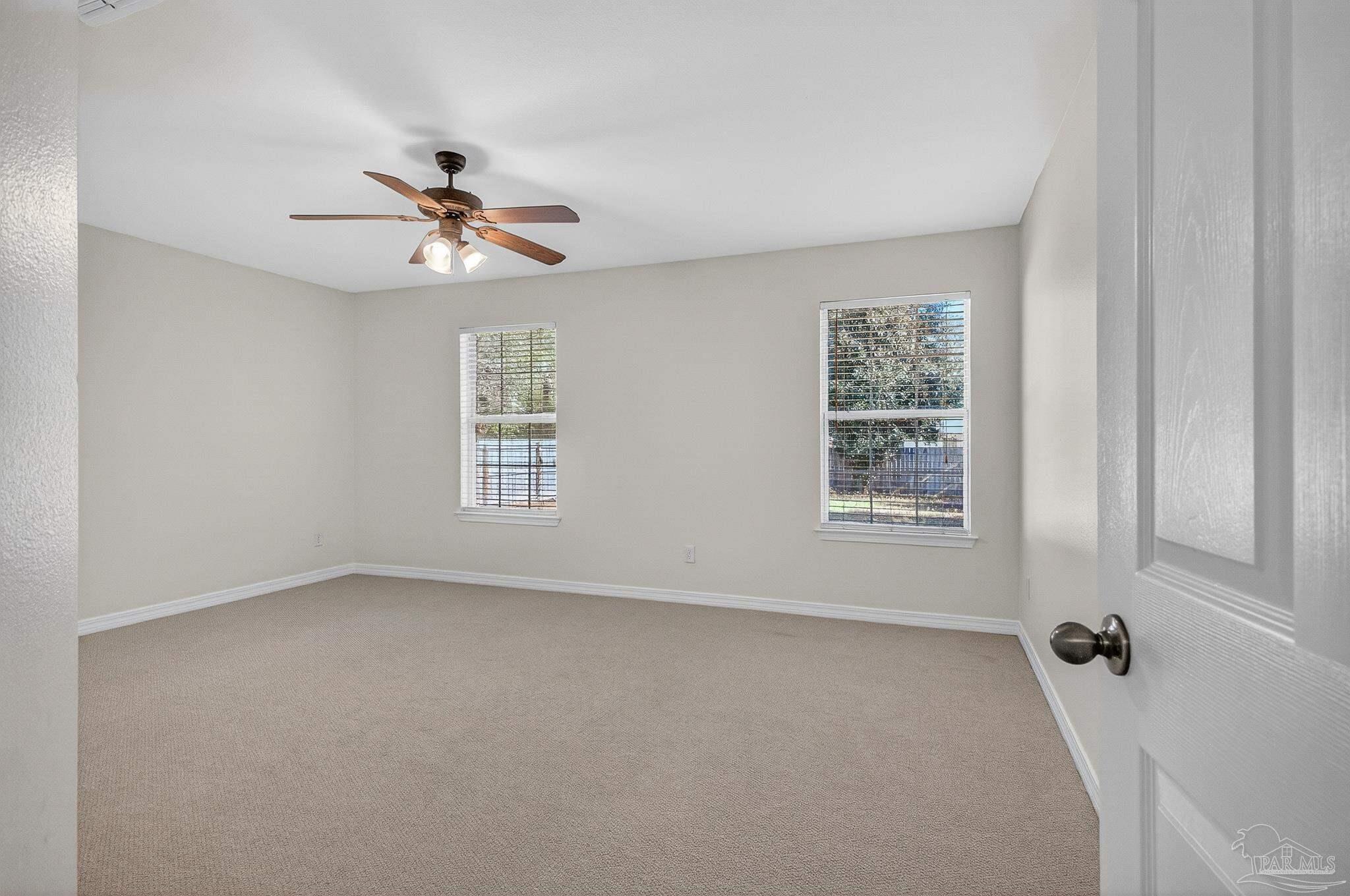 6050 Antelope Street Milton, FL 32570 - Photo 42 of 58 a view of an empty room with a window