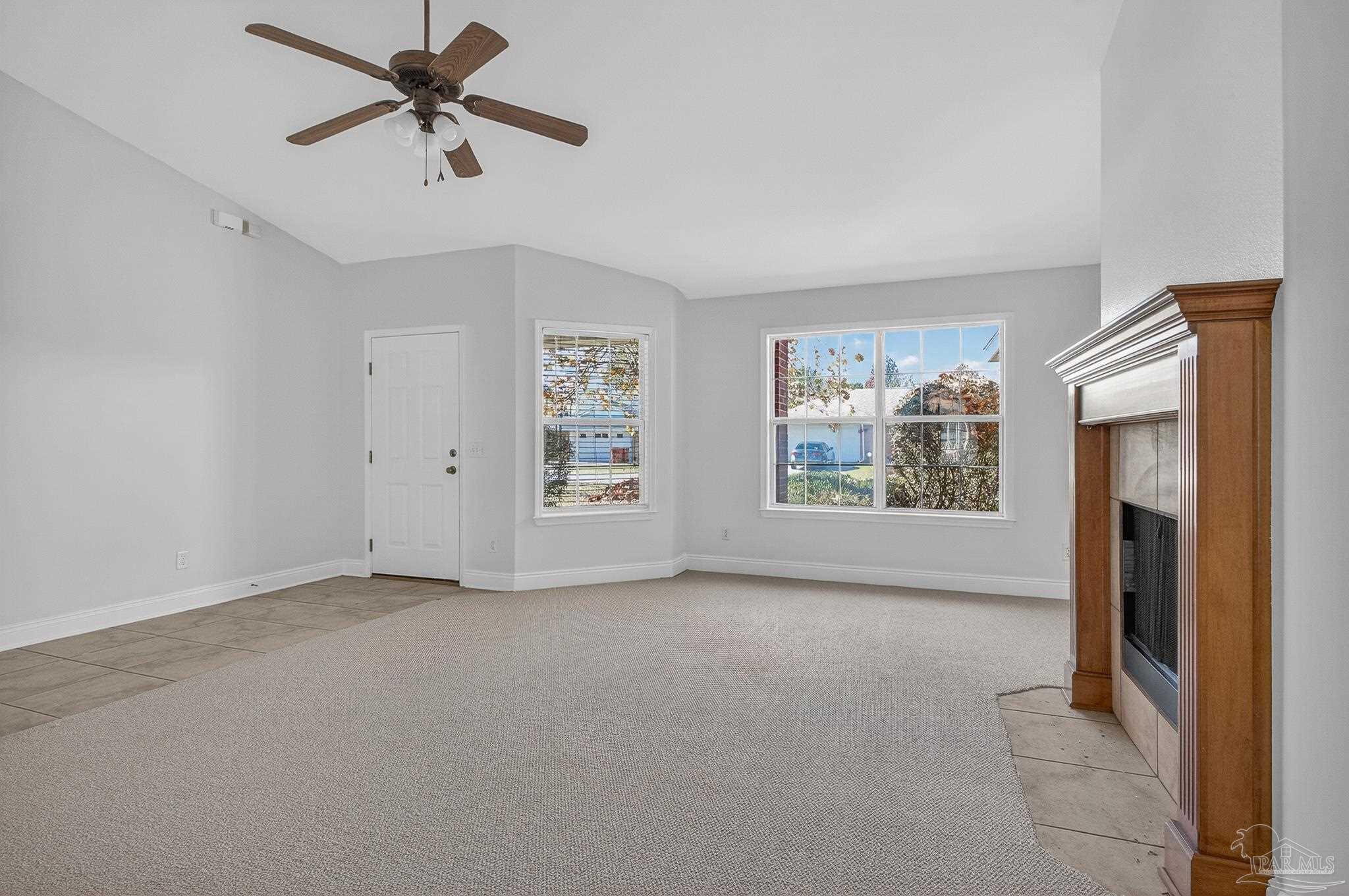 6050 Antelope Street Milton, FL 32570 - Photo 9 of 58 a view of workspace with window and a ceiling fan
