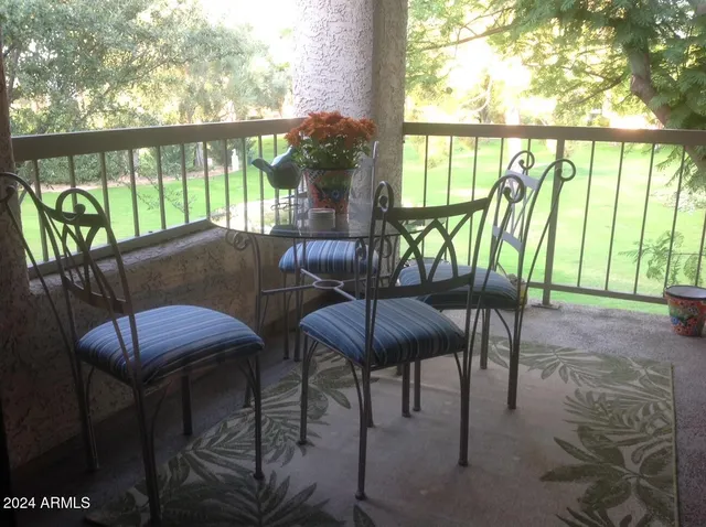 a view of a patio with furniture