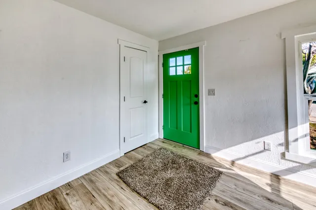 a view of an entryway with bathroom