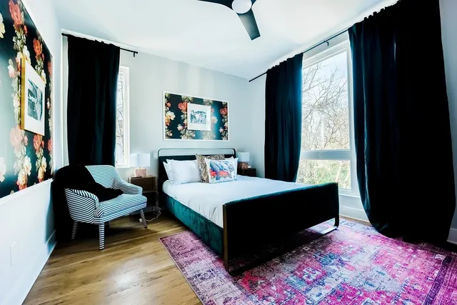 a bedroom with a bed and cupboard