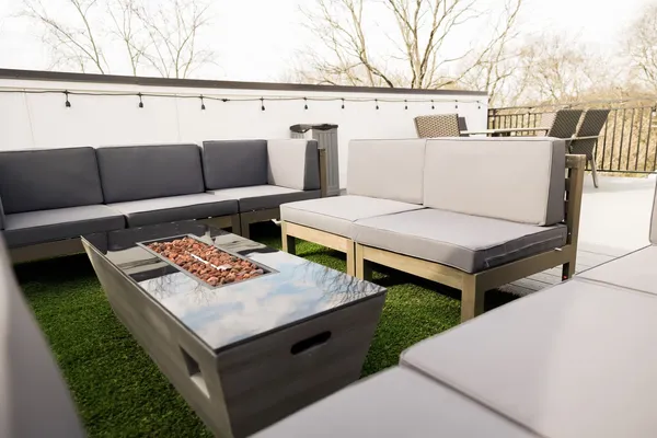 a living room with furniture and a couch