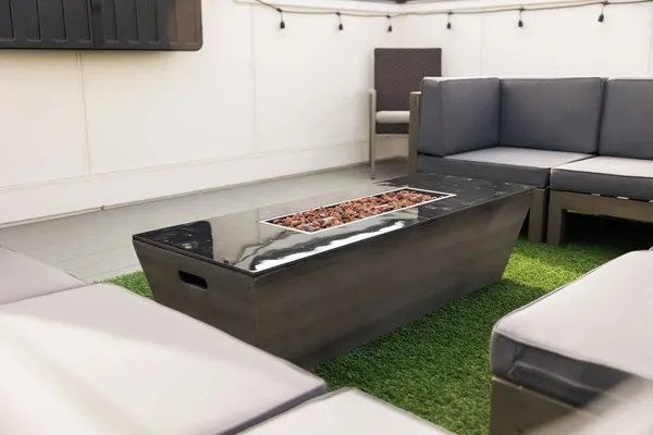 a kitchen with a stove and a refrigerator