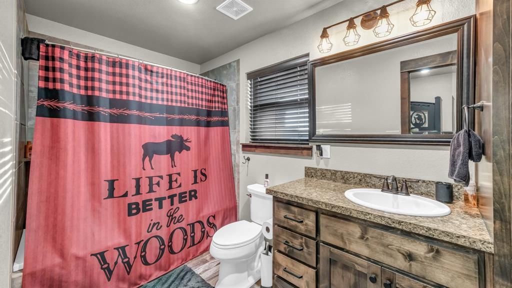 1140 Garvey Ranch Road Olney, TX 76374 - Photo 14 of 40 Master bathroom