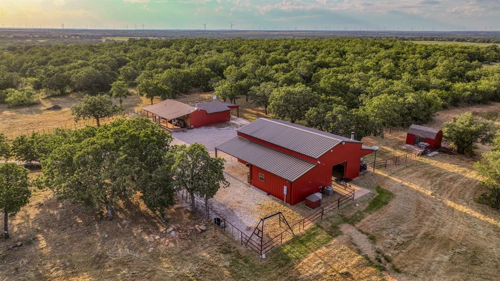 1140 Garvey Ranch Road Loving, TX 76460 - Photo 3 of 40 an aerial view of a house with a yard