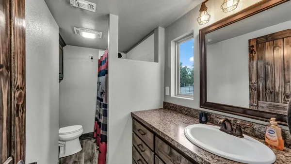 a kitchen with stainless steel appliances granite countertop a stove and a sink
