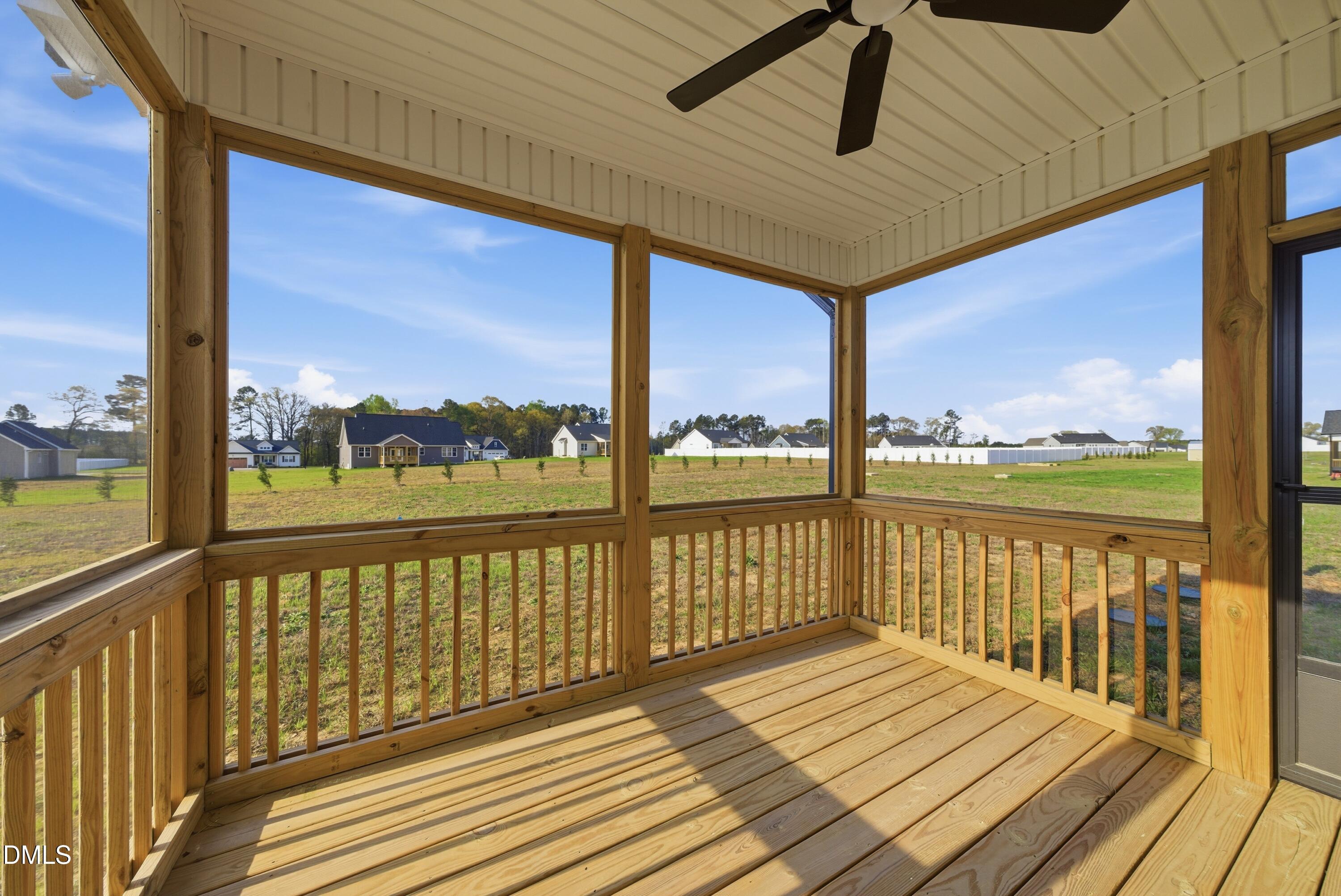 9315 Turkey Way Middlesex, NC 27557 - Photo 13 of 34 a view of a balcony with wooden floor