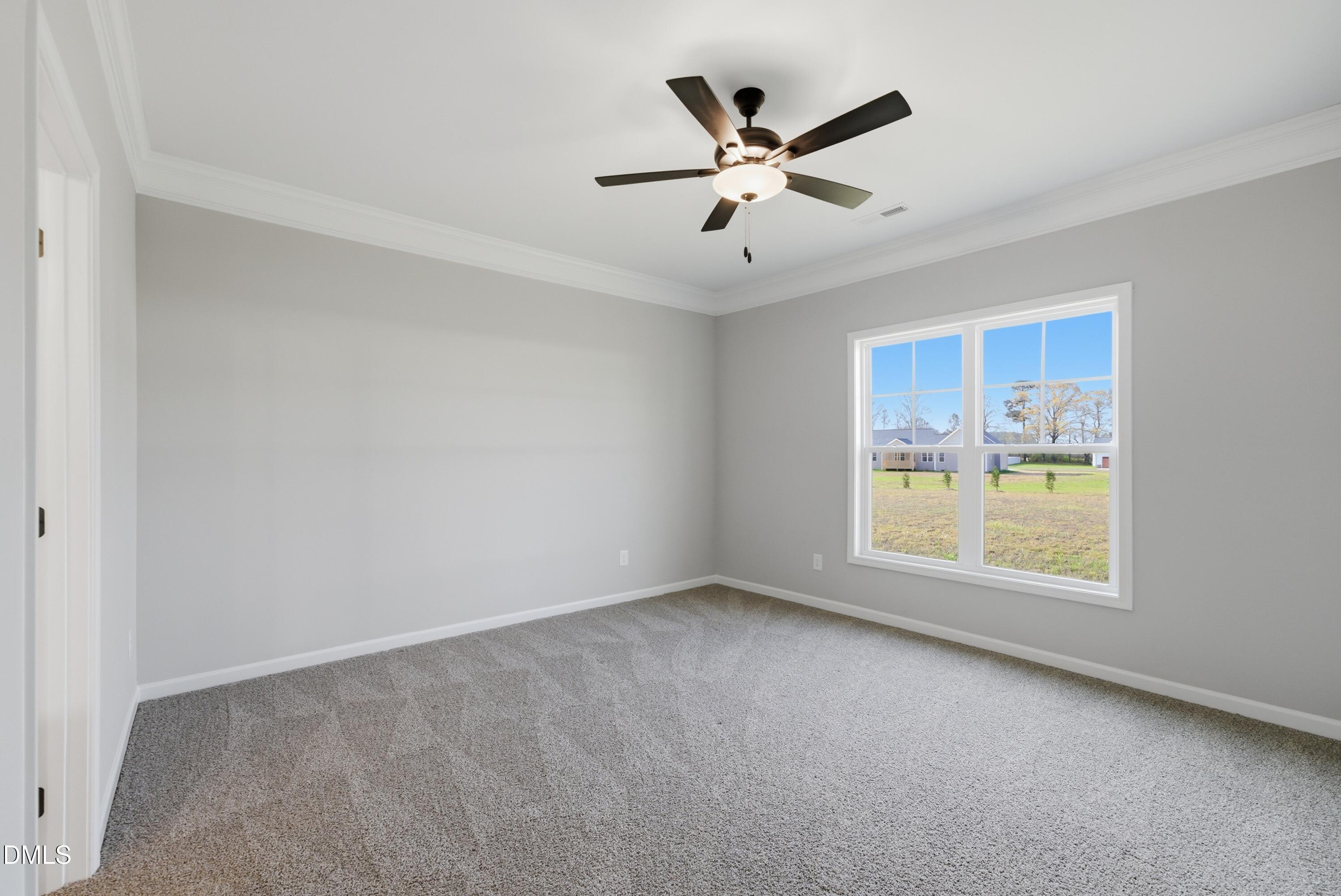 9315 Turkey Way Middlesex, NC 27557 - Photo 16 of 34 a view of an empty room with a window