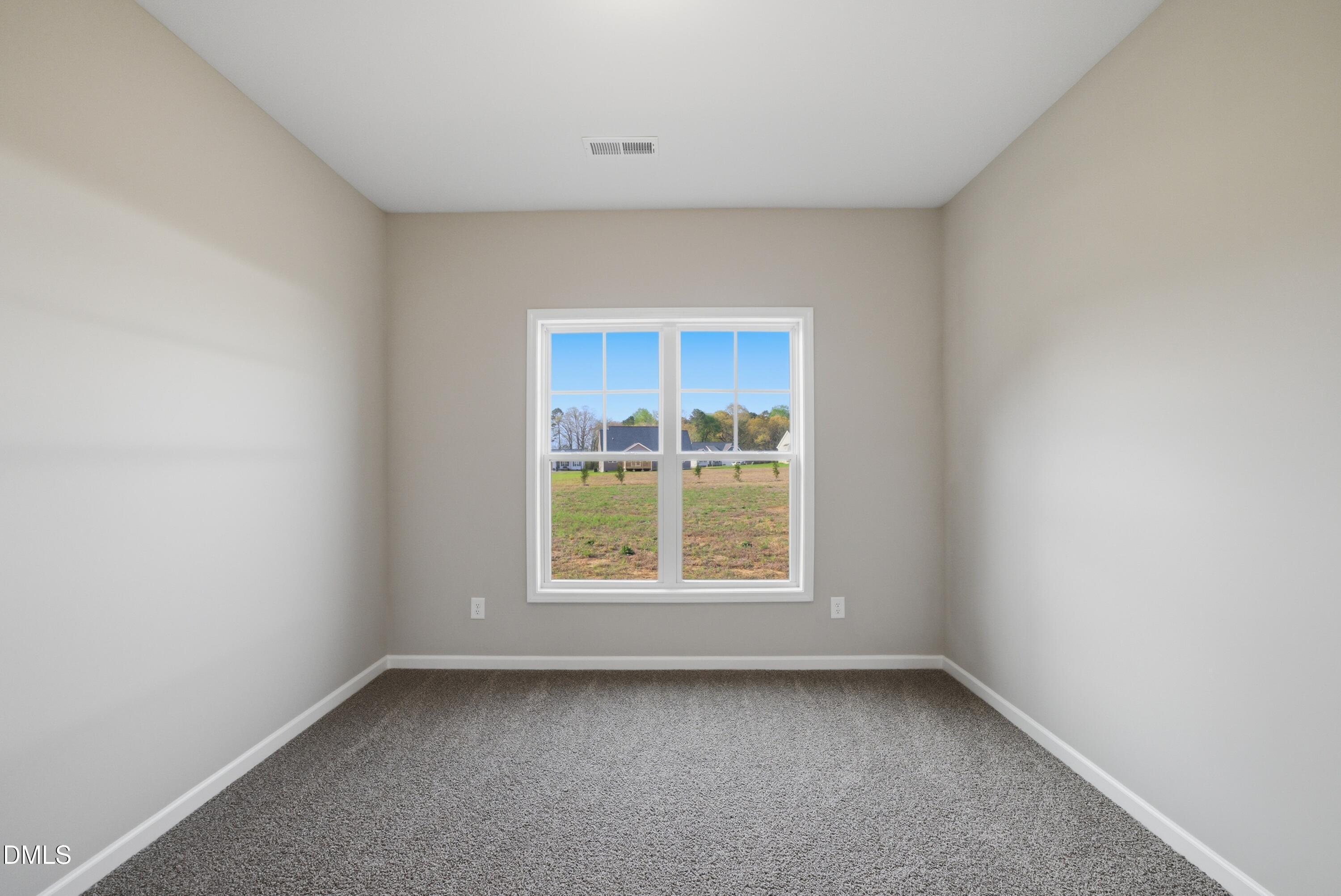 9315 Turkey Way Middlesex, NC 27557 - Photo 19 of 34 an empty room with a window