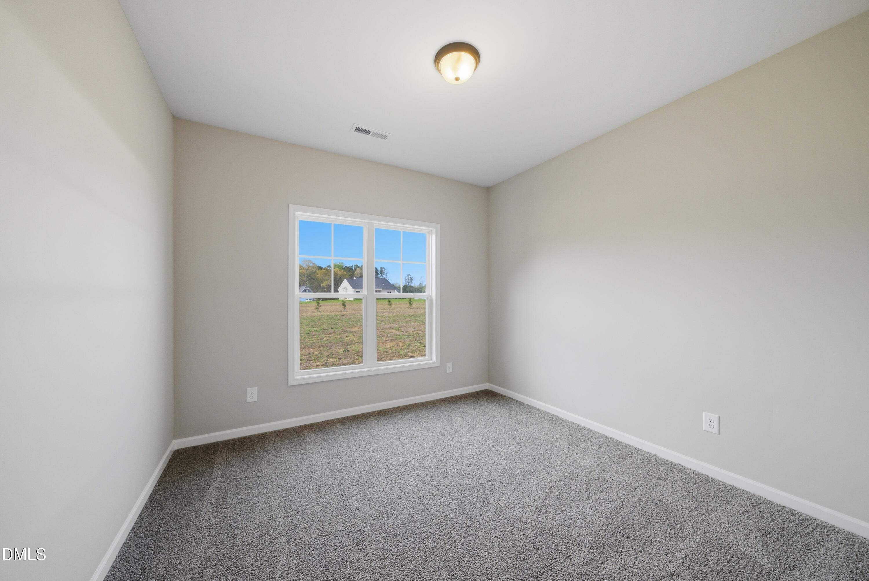 9315 Turkey Way Middlesex, NC 27557 - Photo 20 of 34 an empty room with a window