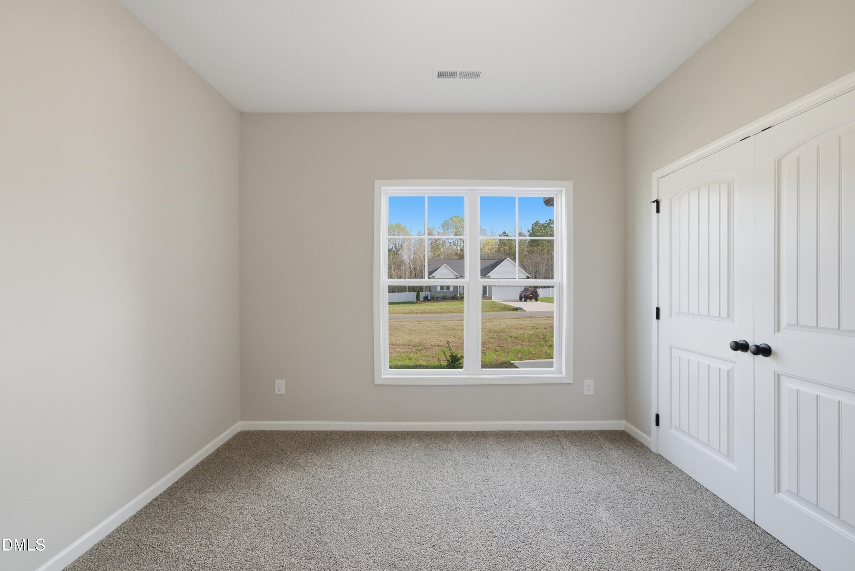 9315 Turkey Way Middlesex, NC 27557 - Photo 22 of 34 an empty room with a window