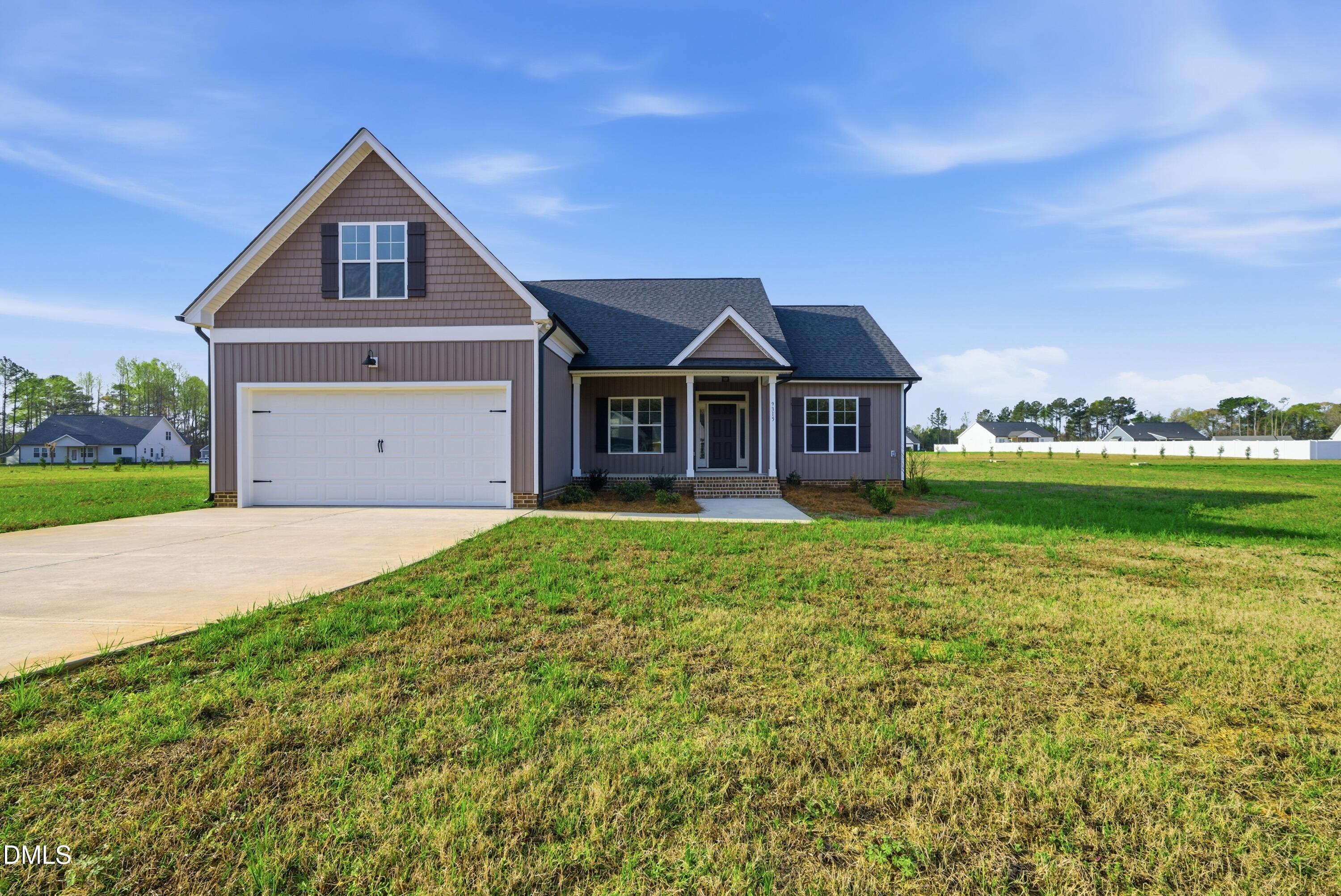 9315 Turkey Way Middlesex, NC 27557 - Photo 28 of 34 a front view of a house with a yard