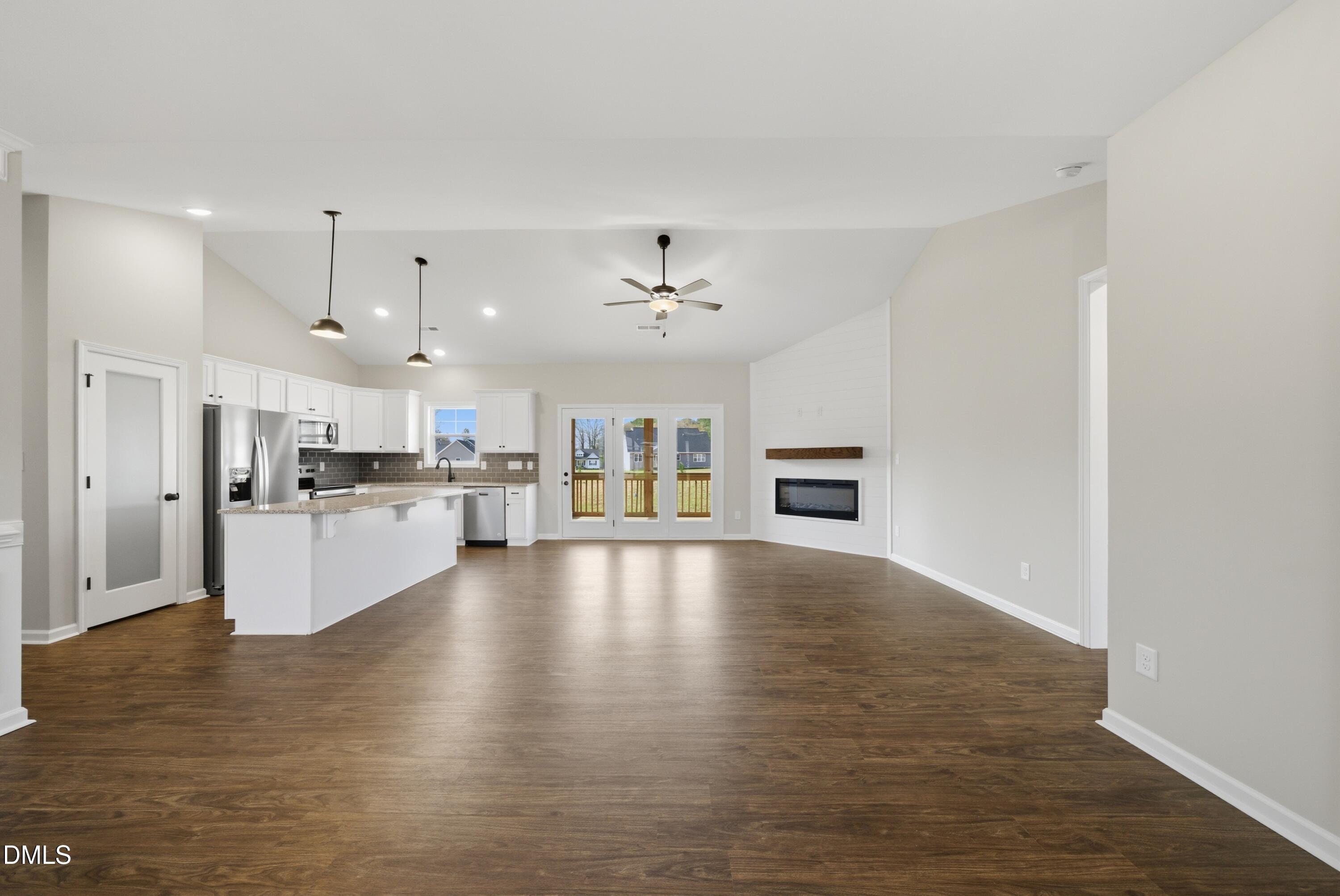 9315 Turkey Way Middlesex, NC 27557 - Photo 8 of 34 a view of kitchen with kitchen island and stainless steel appliances