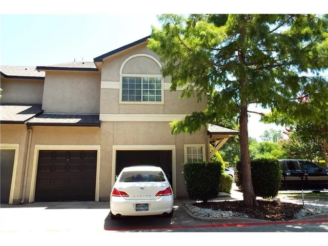 a white house with a outdoor space